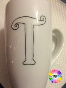 Use the paint pen to trace the image mug zentangle